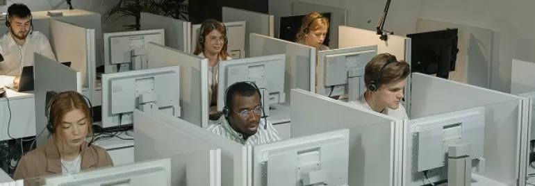 office workers sitting at their desks