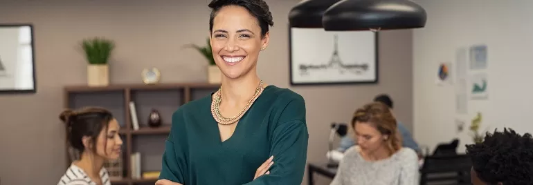 Female professional smiling in an office setting